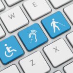 Three accessibility icon on computer keyboard